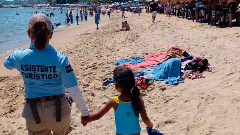 Localiza Policía Turística a menor reportada como desaparecida en playa Papagayo